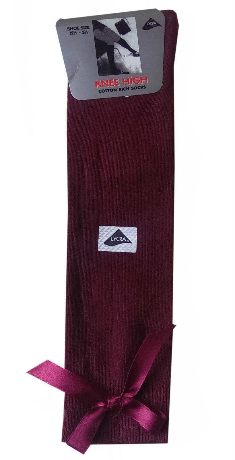 GIRLS KNEE HIGH COTTON LYCRA SOCKS WITH MATCHING BOW.