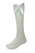 GIRLS KNEE HIGH COTTON LYCRA SOCKS WITH MATCHING BOW.